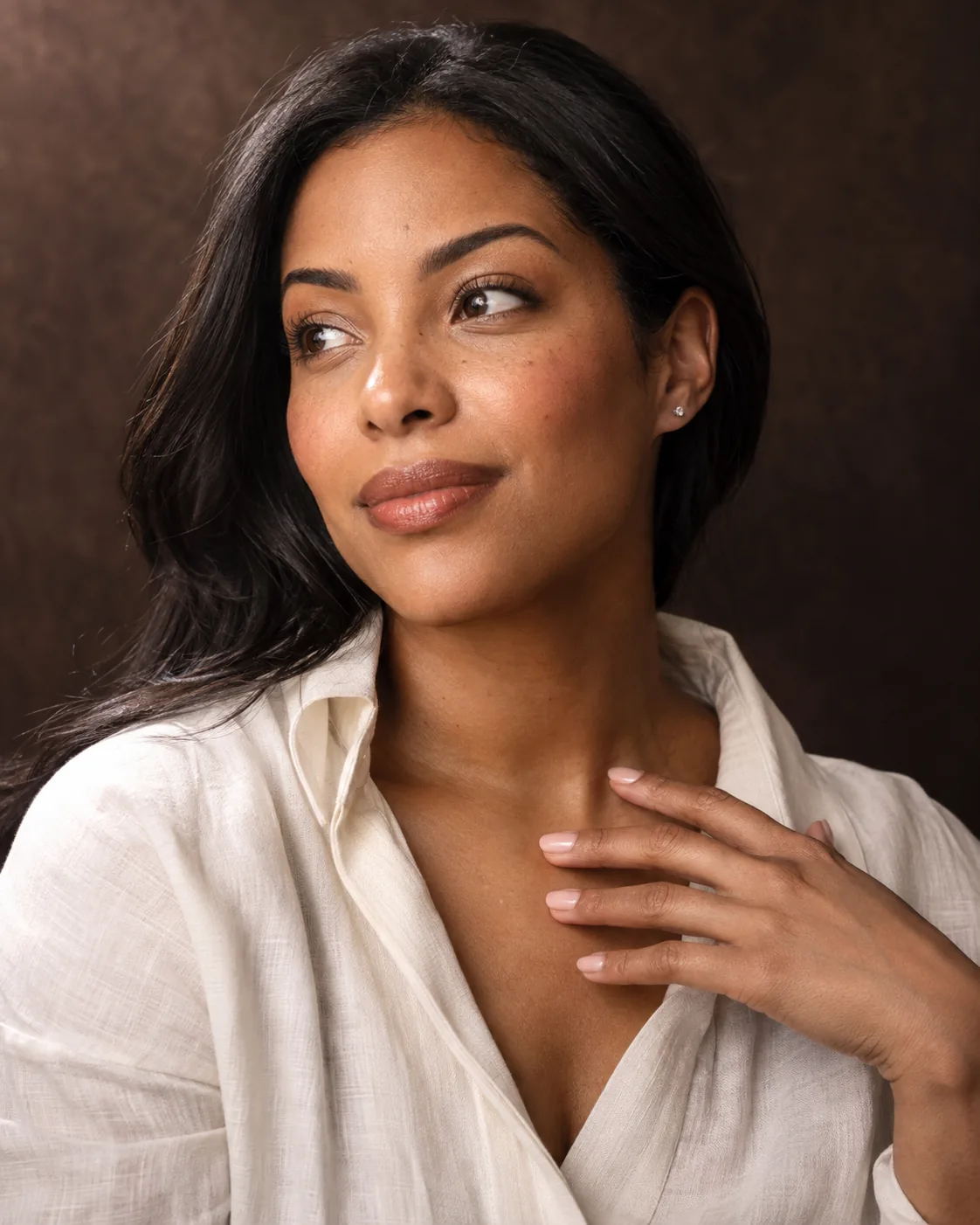 Editorial portrait of an adult woman in warm natural light
