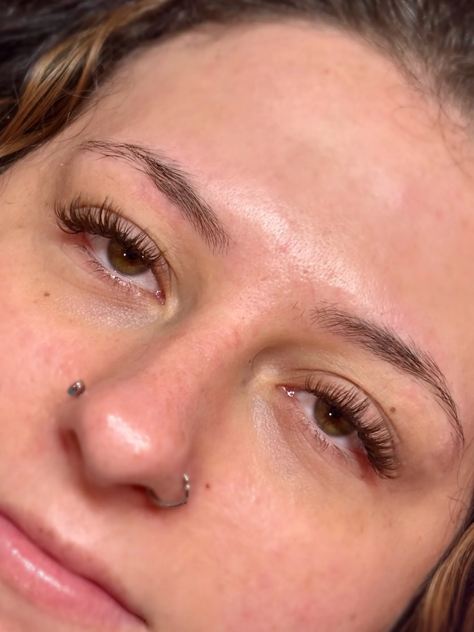 Brown lash extensions by Maci
