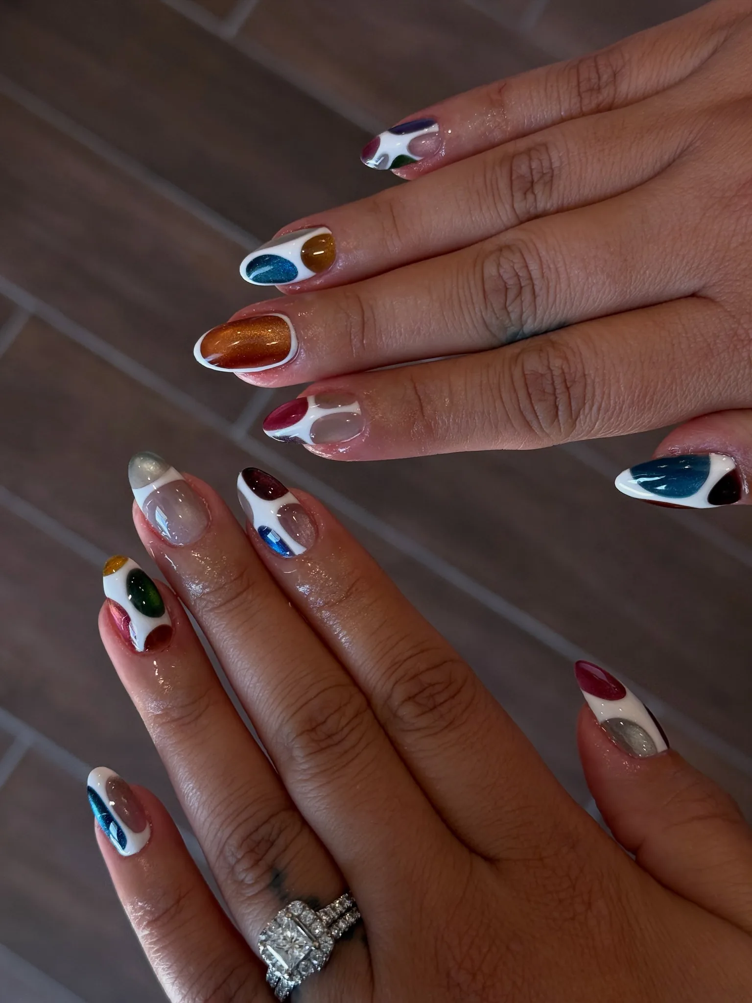 Multicolor jewel-toned nail art by Jasnia